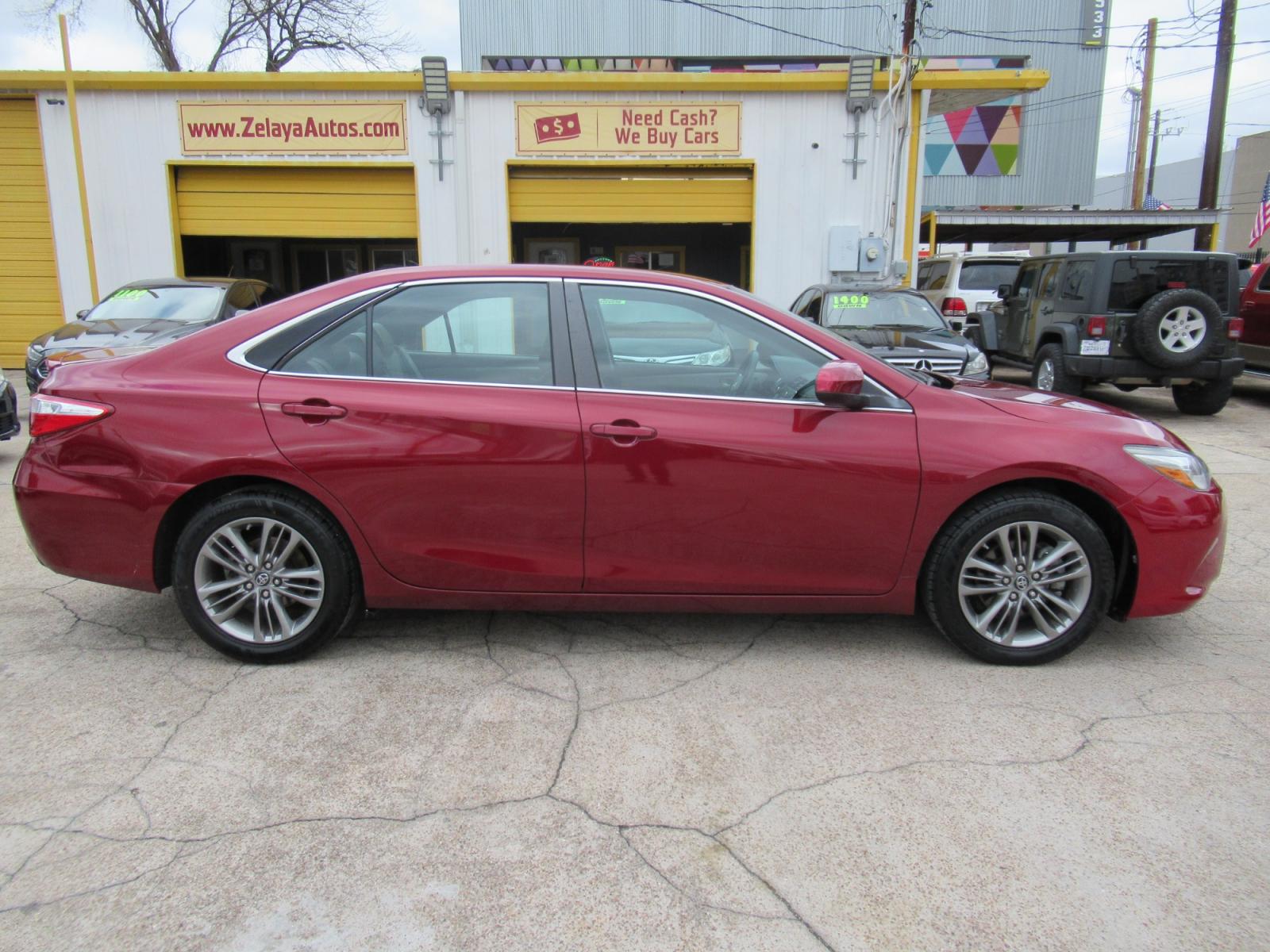 2016 Red /Gray Toyota Camry SE (4T1BF1FK0GU) with an 2.5L L4 DOHC 16V engine, Automatic transmission, located at 1511 North Shepherd Dr., Houston, TX, 77008, (281) 657-1221, 29.798361, -95.412560 - 2016 TOYOTA CAMRY SE VIN: 4T1BF1FK0GU603177 4 T 1 B F 1 F K 0 G U 6 0 3 1 7 7 SEDAN 4 DR 2.5L I4 F DOHC 16V GASOLINE FRONT WHEEL DRIVE - Photo #0
